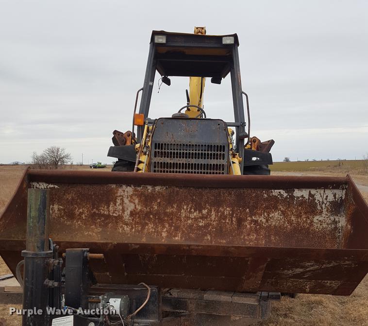 image for item L1729 Ford 555C backhoe