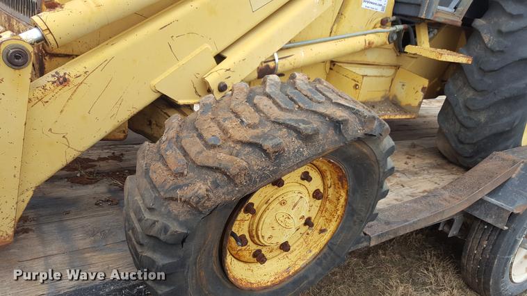 image for item L1729 Ford 555C backhoe
