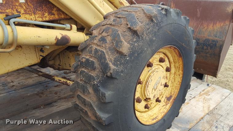 image for item L1729 Ford 555C backhoe