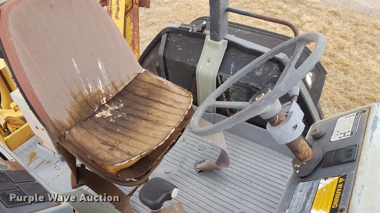 image for item L1729 Ford 555C backhoe