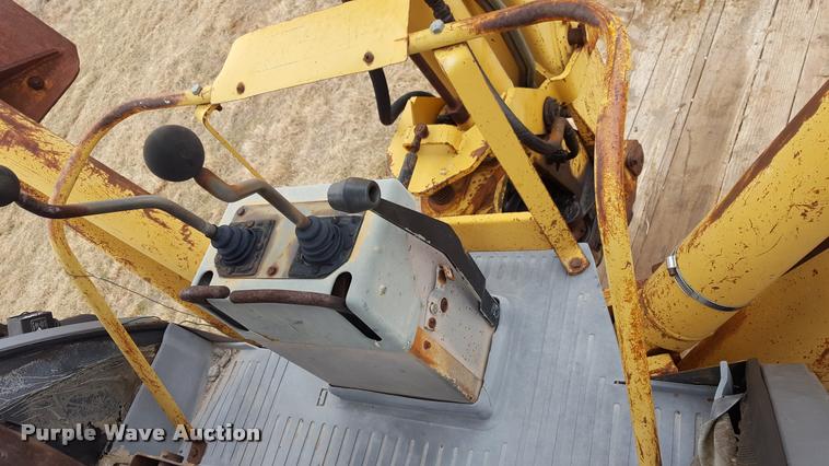 image for item L1729 Ford 555C backhoe