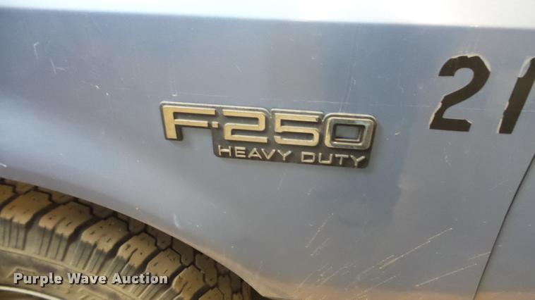 image for item BU9252 1997 Ford F250 flatbed pickup truck