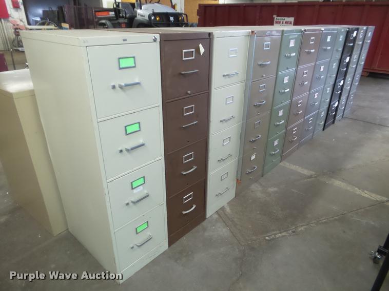 image for item DG9400 (11) four drawer filing cabinets