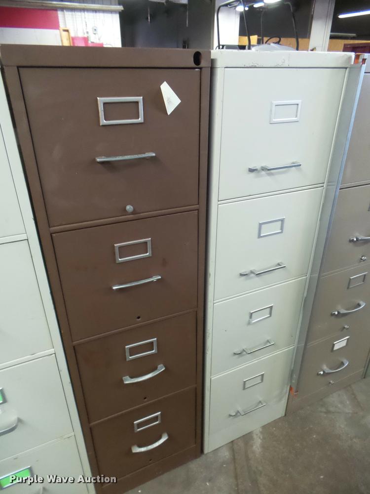 image for item DG9400 (11) four drawer filing cabinets