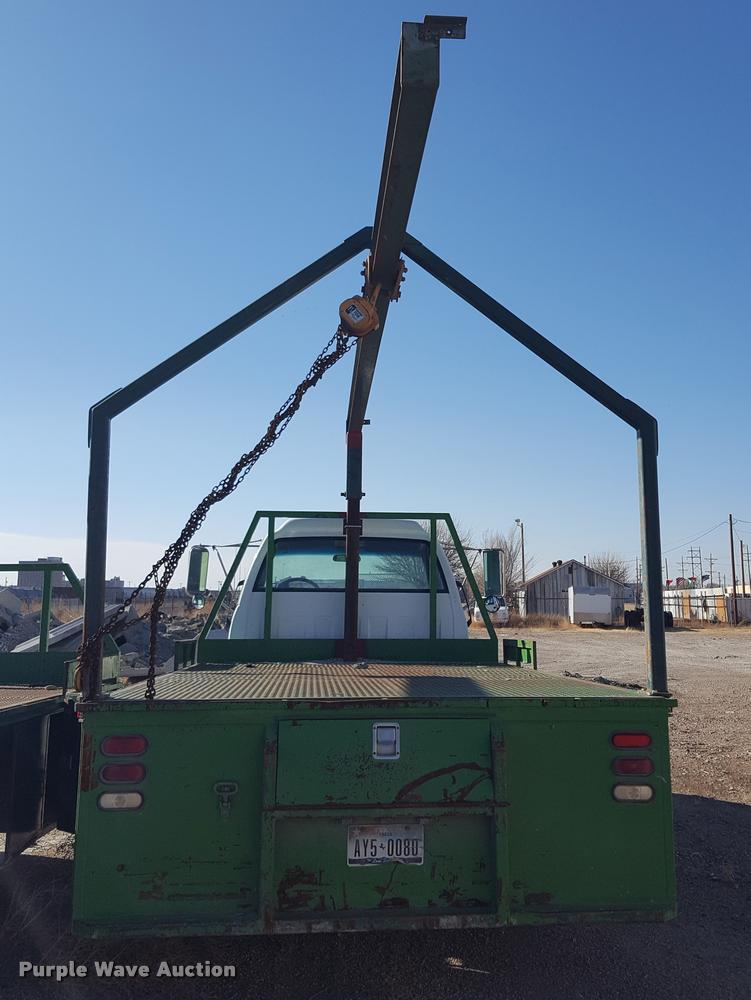 image for item L1721 1998 GMC C6500 flatbed truck