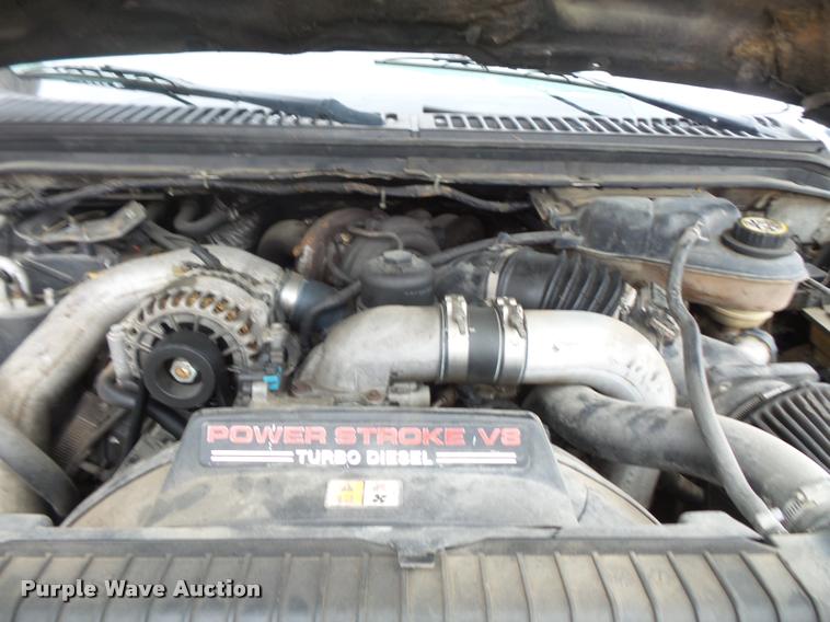 image for item L3630 2004 Ford F550 SuperCab flatbed truck