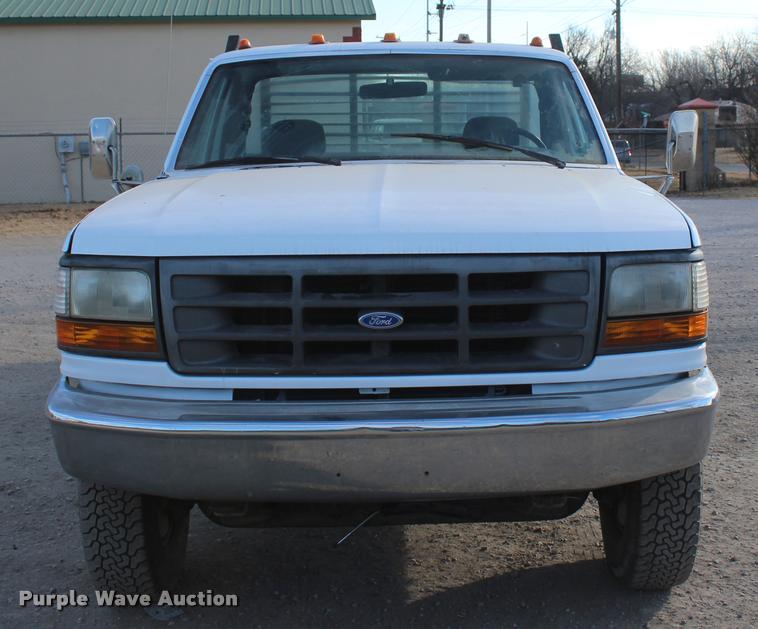 image for item L4950 1993 Ford F450 Super Duty flatbed pickup truck