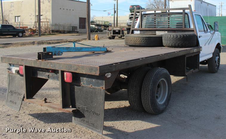 image for item L4950 1993 Ford F450 Super Duty flatbed pickup truck