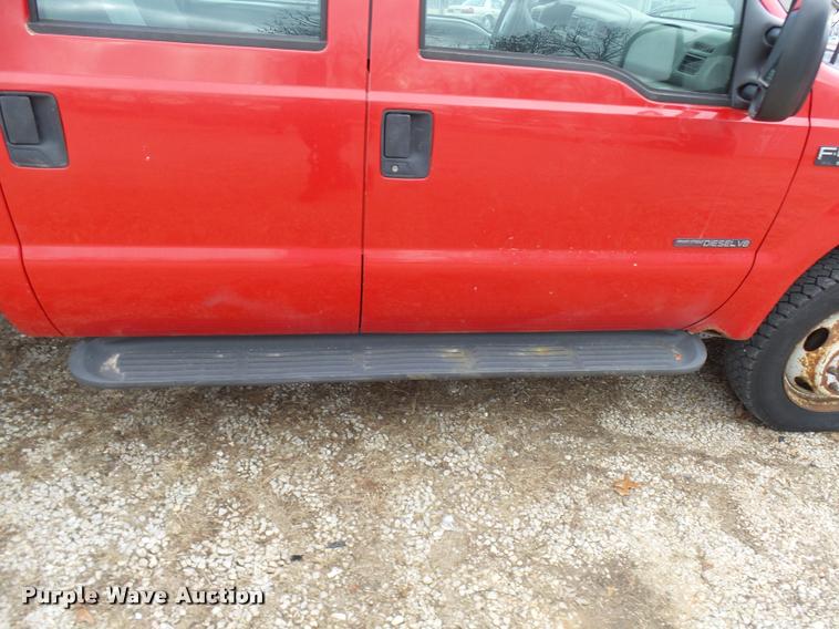 image for item L7227 2000 Ford F450 Super Duty XL Crew Cab flatbed truck