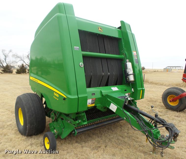 image for item DB1846 2014 John Deere 569 Premium round baler