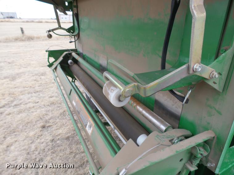 image for item DB1846 2014 John Deere 569 Premium round baler