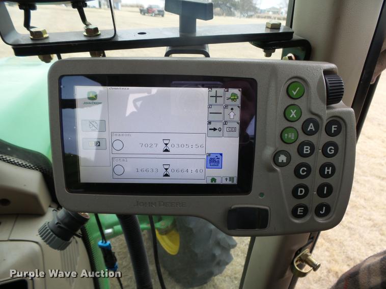 image for item DB1846 2014 John Deere 569 Premium round baler