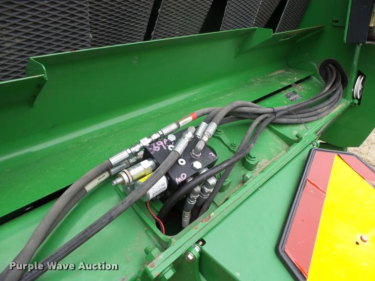 image for item DB1846 2014 John Deere 569 Premium round baler