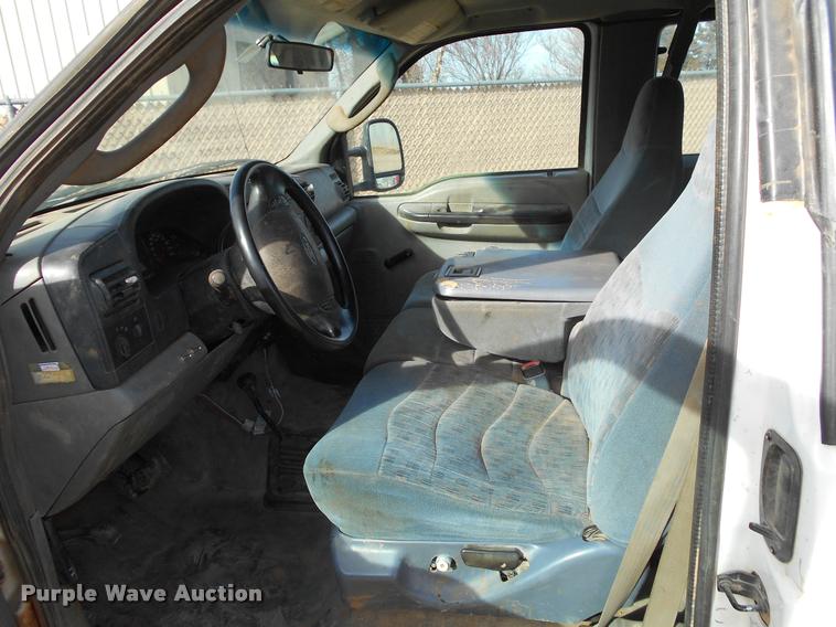 image for item BU9418 2006 Ford F250 Super Duty SuperCab flatbed pickup truck