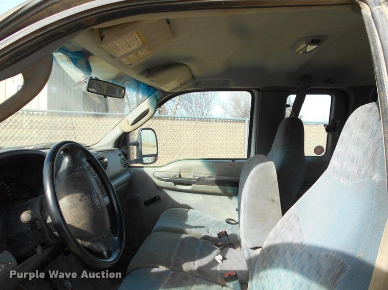 image for item BU9418 2006 Ford F250 Super Duty SuperCab flatbed pickup truck