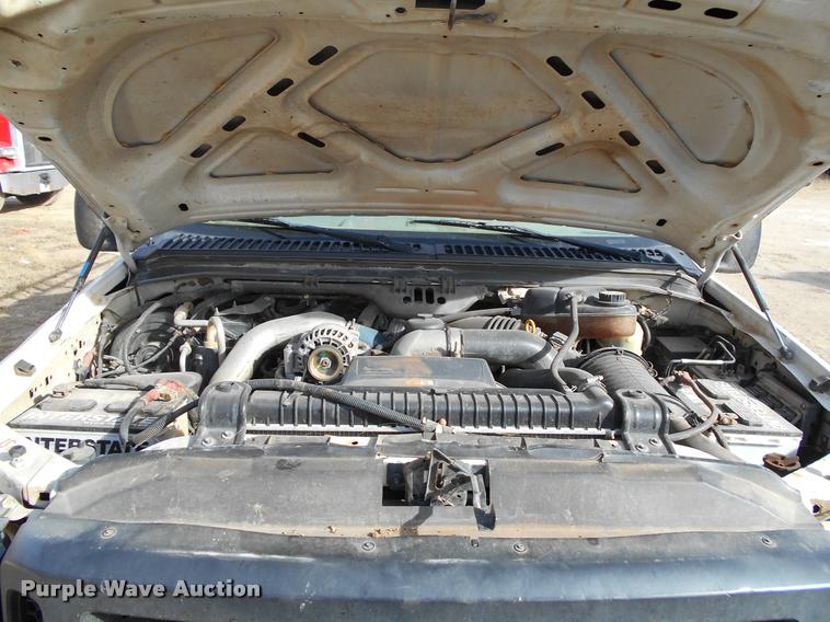 image for item BU9418 2006 Ford F250 Super Duty SuperCab flatbed pickup truck