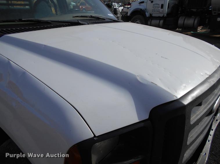 image for item BU9418 2006 Ford F250 Super Duty SuperCab flatbed pickup truck