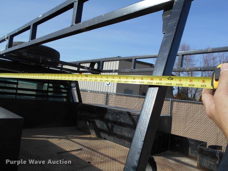 image for item BU9418 2006 Ford F250 Super Duty SuperCab flatbed pickup truck