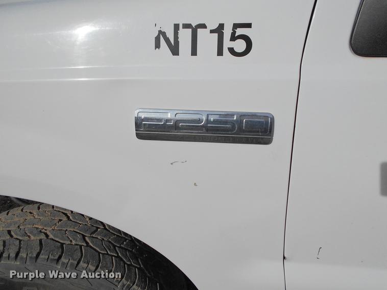 image for item BU9418 2006 Ford F250 Super Duty SuperCab flatbed pickup truck