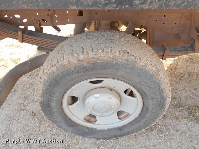 image for item BU9418 2006 Ford F250 Super Duty SuperCab flatbed pickup truck