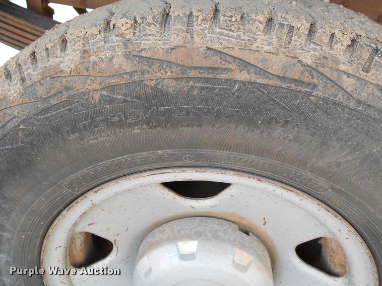 image for item BU9418 2006 Ford F250 Super Duty SuperCab flatbed pickup truck