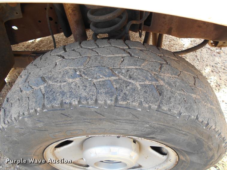 image for item BU9418 2006 Ford F250 Super Duty SuperCab flatbed pickup truck