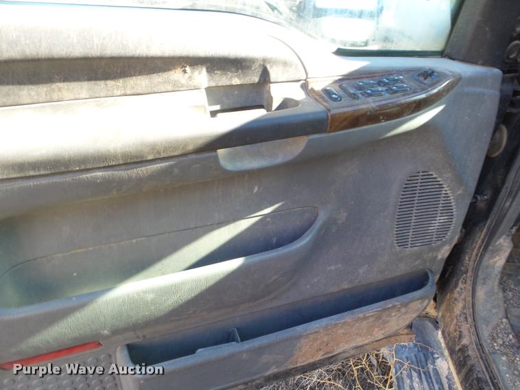 image for item DA7578 2002 Ford F250 Super Duty Crew Cab flatbed pickup truck