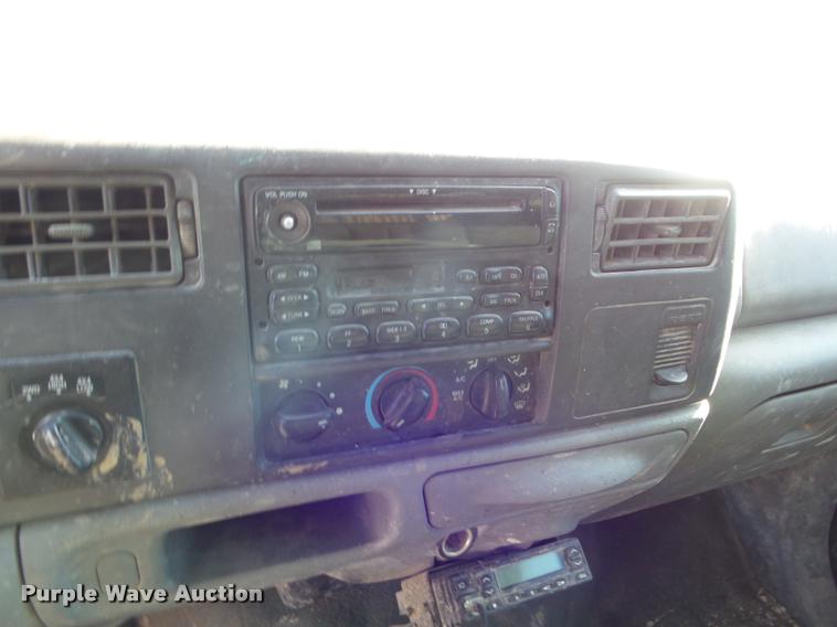 image for item DA7578 2002 Ford F250 Super Duty Crew Cab flatbed pickup truck