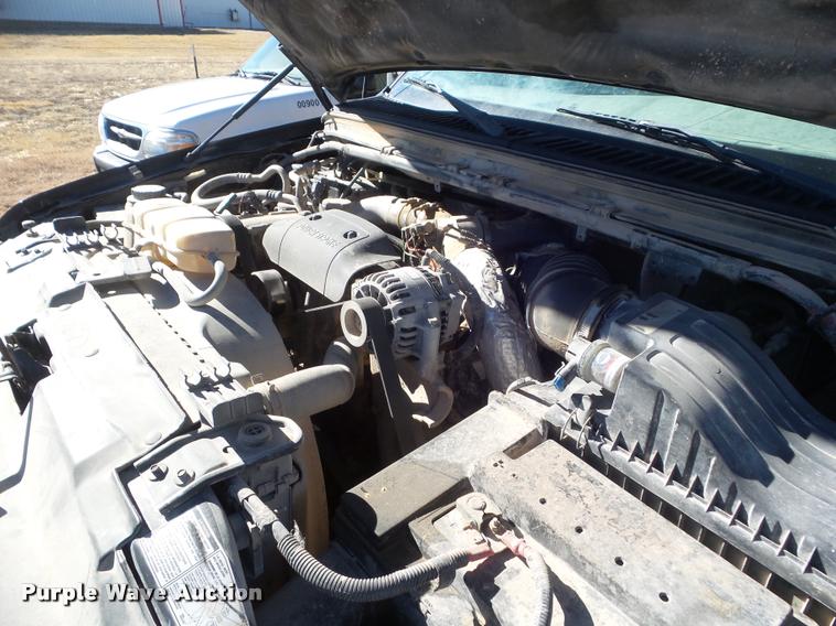 image for item DA7578 2002 Ford F250 Super Duty Crew Cab flatbed pickup truck