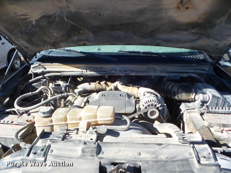 image for item DA7578 2002 Ford F250 Super Duty Crew Cab flatbed pickup truck