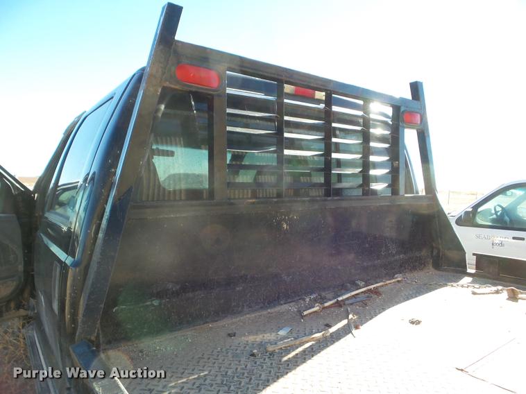 image for item DA7578 2002 Ford F250 Super Duty Crew Cab flatbed pickup truck