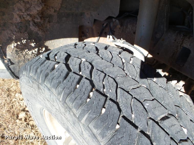 image for item DA7578 2002 Ford F250 Super Duty Crew Cab flatbed pickup truck