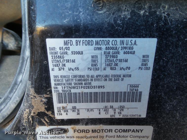 image for item DA7578 2002 Ford F250 Super Duty Crew Cab flatbed pickup truck