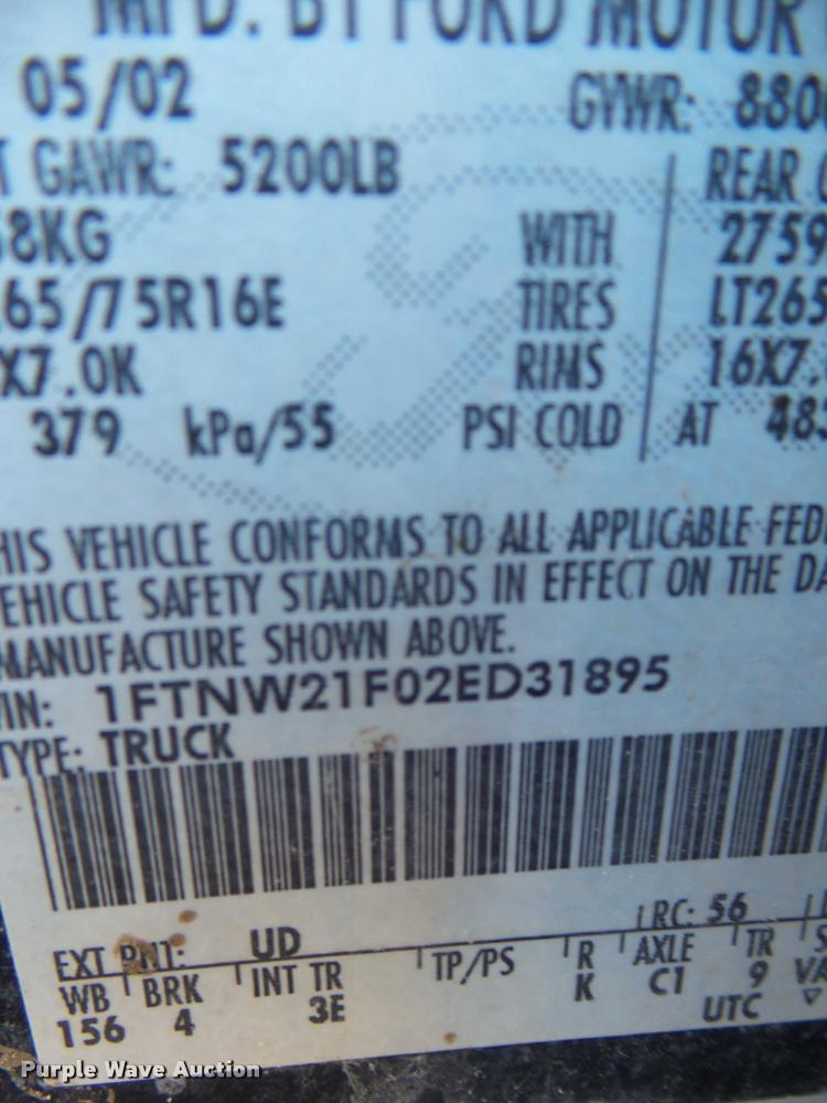 image for item DA7578 2002 Ford F250 Super Duty Crew Cab flatbed pickup truck