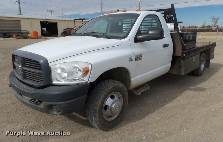 image for item DB1879 2007 Dodge Ram 3500HD flatbed pickup truck