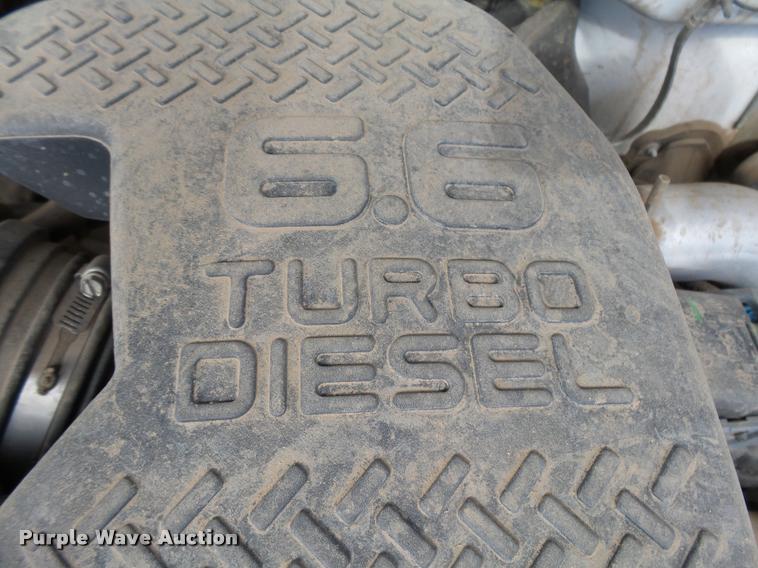 image for item DB1899 2005 Chevrolet Silverado 3500 flatbed pickup truck