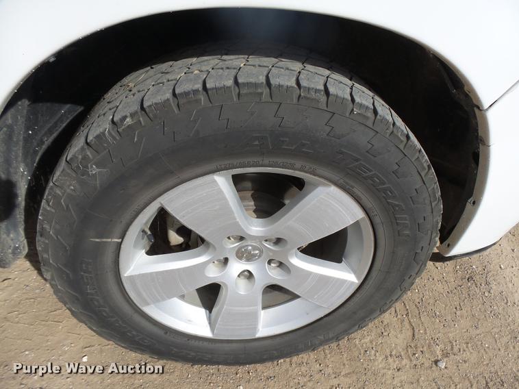 image for item DB1906 2012 Dodge Ram 1500 Quad Cab pickup truck