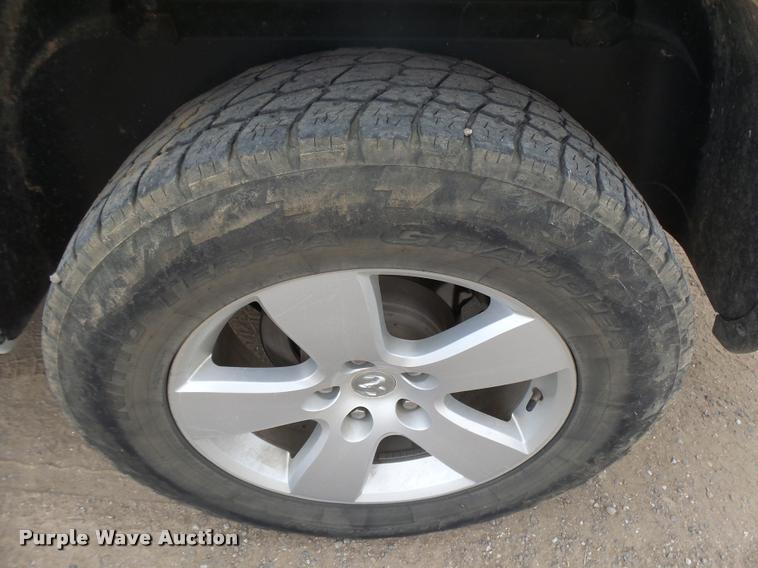 image for item DB1906 2012 Dodge Ram 1500 Quad Cab pickup truck