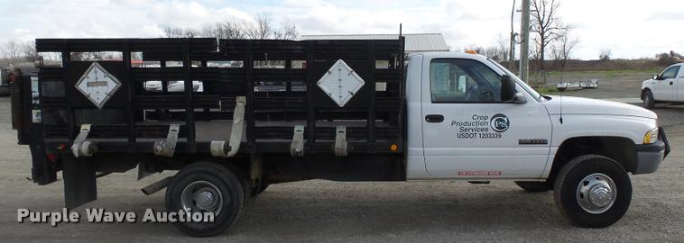 image for item K3401 2001 Dodge Ram 3500 flatbed pickup truck