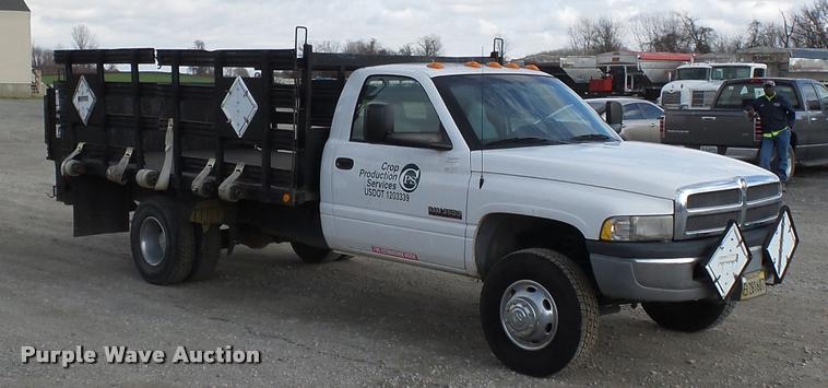 image for item K3401 2001 Dodge Ram 3500 flatbed pickup truck