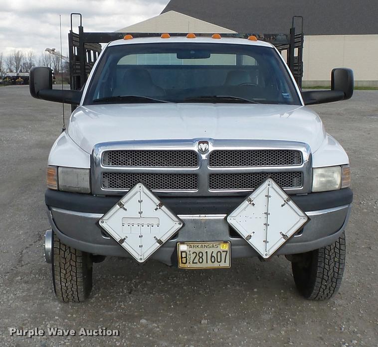 image for item K3401 2001 Dodge Ram 3500 flatbed pickup truck