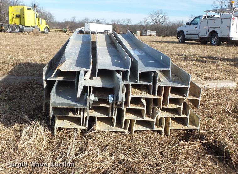 image for item L4530 Approximately 23 galvanized guard rail posts