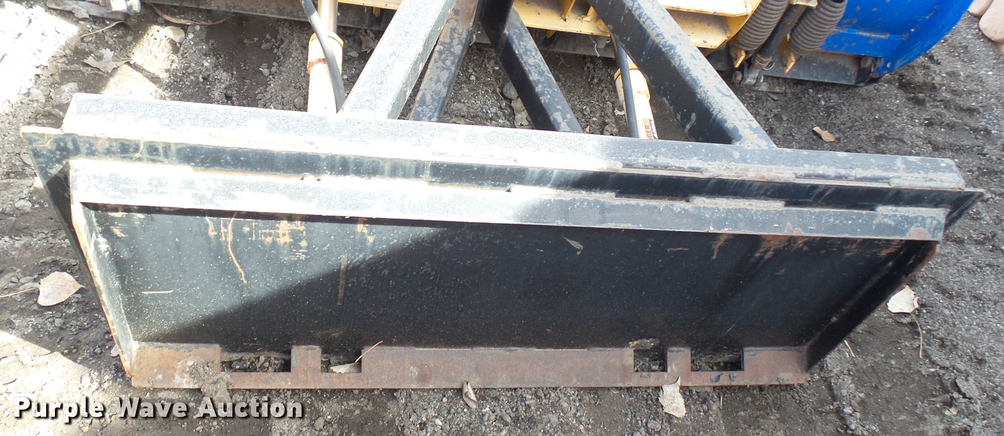 Wolf skid steer snow plow in Wichita, KS Item AT9574 sold Purple Wave