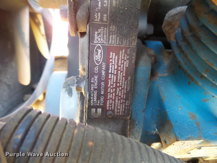 image for item DA2523 1994 Ford F700 flatbed truck