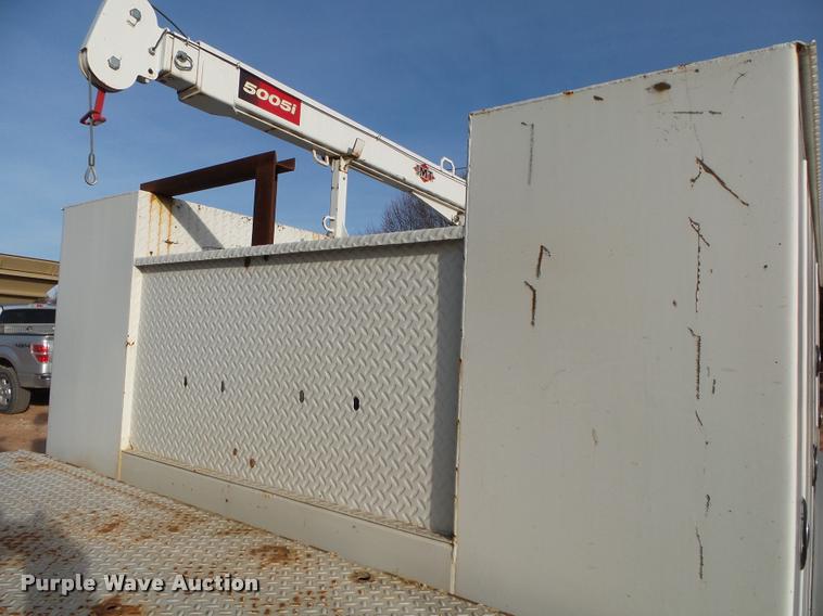 image for item DA2527 1999 Freightliner FL70 service truck with crane