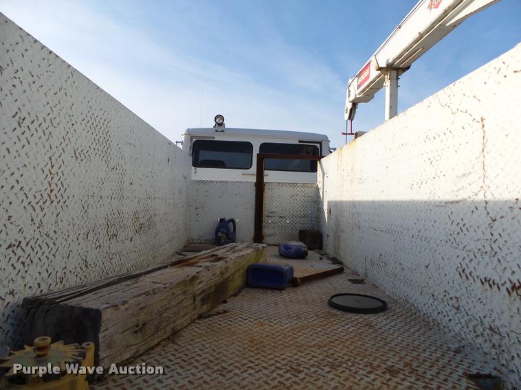 image for item DA2527 1999 Freightliner FL70 service truck with crane