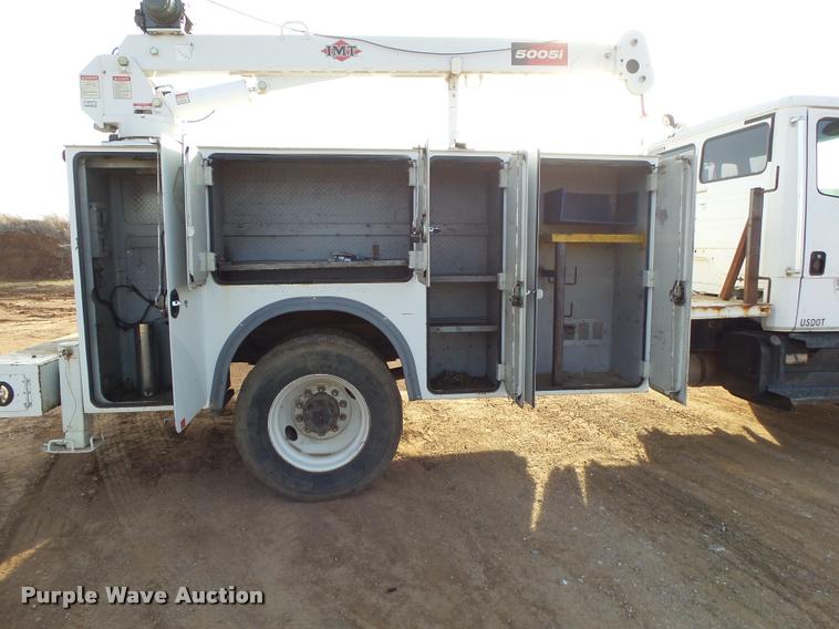 image for item DA2527 1999 Freightliner FL70 service truck with crane