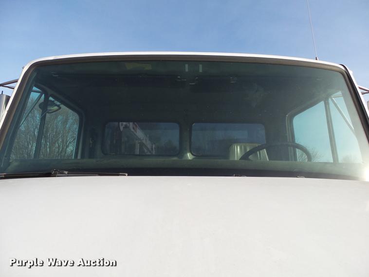 image for item DA2527 1999 Freightliner FL70 service truck with crane