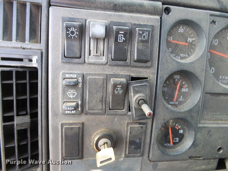 image for item DA2527 1999 Freightliner FL70 service truck with crane