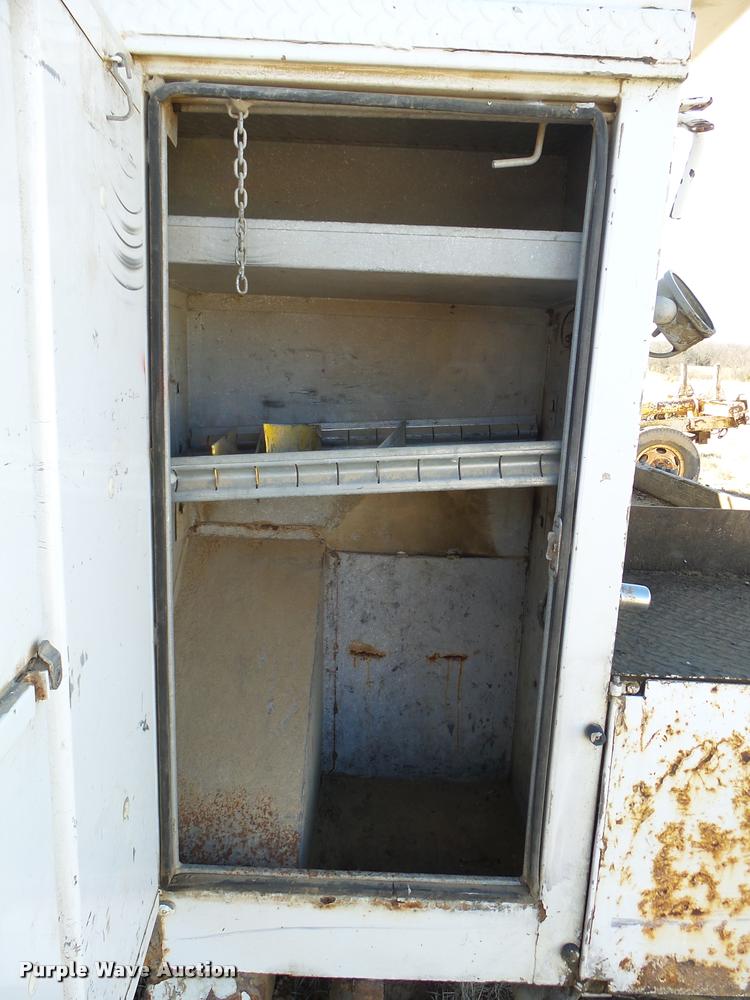 image for item DB2320 1997 GMC C7500 bucket truck